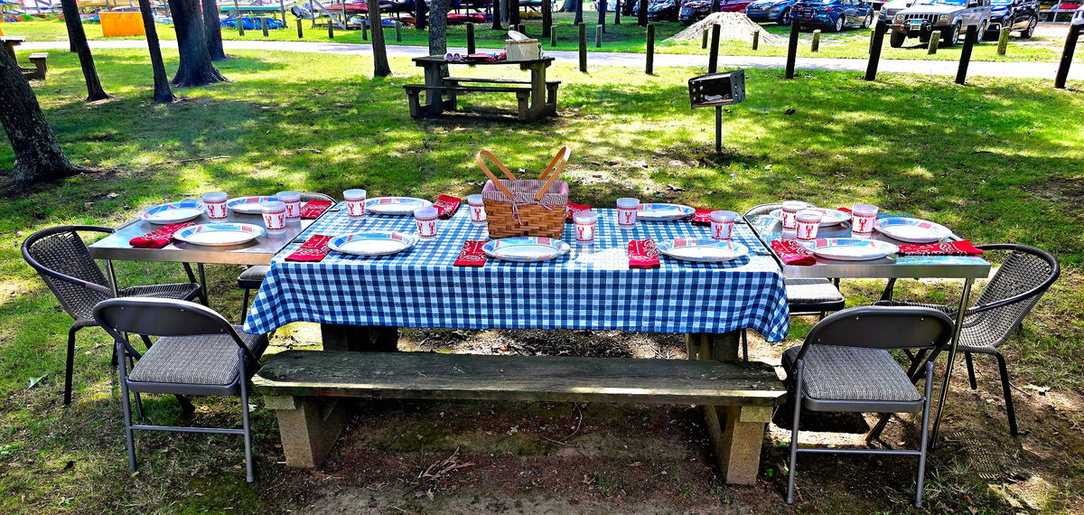 Two Big John Tables turning a park picnic table into a long banquet table with chairs at each end